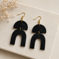 Lakou Horn Earrings — natural horn geometric arch design with gold-tone fishhook hardware